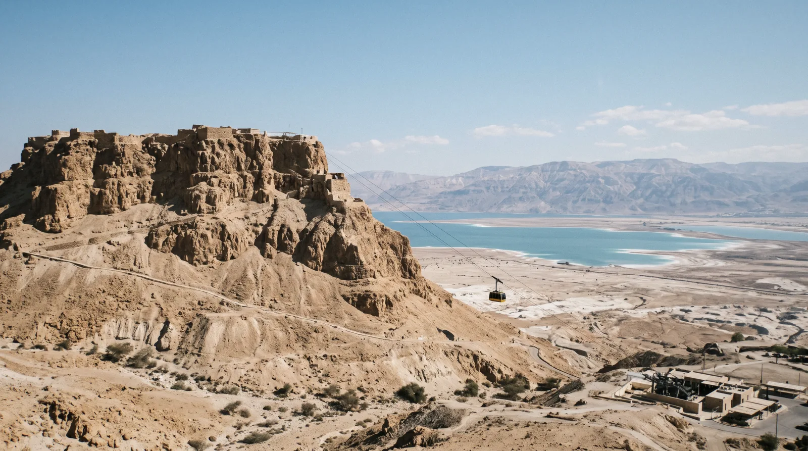 The flat-topped mountain of Masada rising from the desert above the Dead Sea at 09:00, masada and dead sea tour from jerusalem